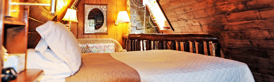 Cabin 1 at Bear Creek Motel & Cabins has a one bedroom upstairs with a Double sized bed